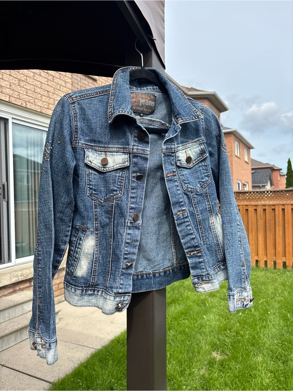 Urban Behavior Women's Blue Distressed Denim Jacket with Stud Accents